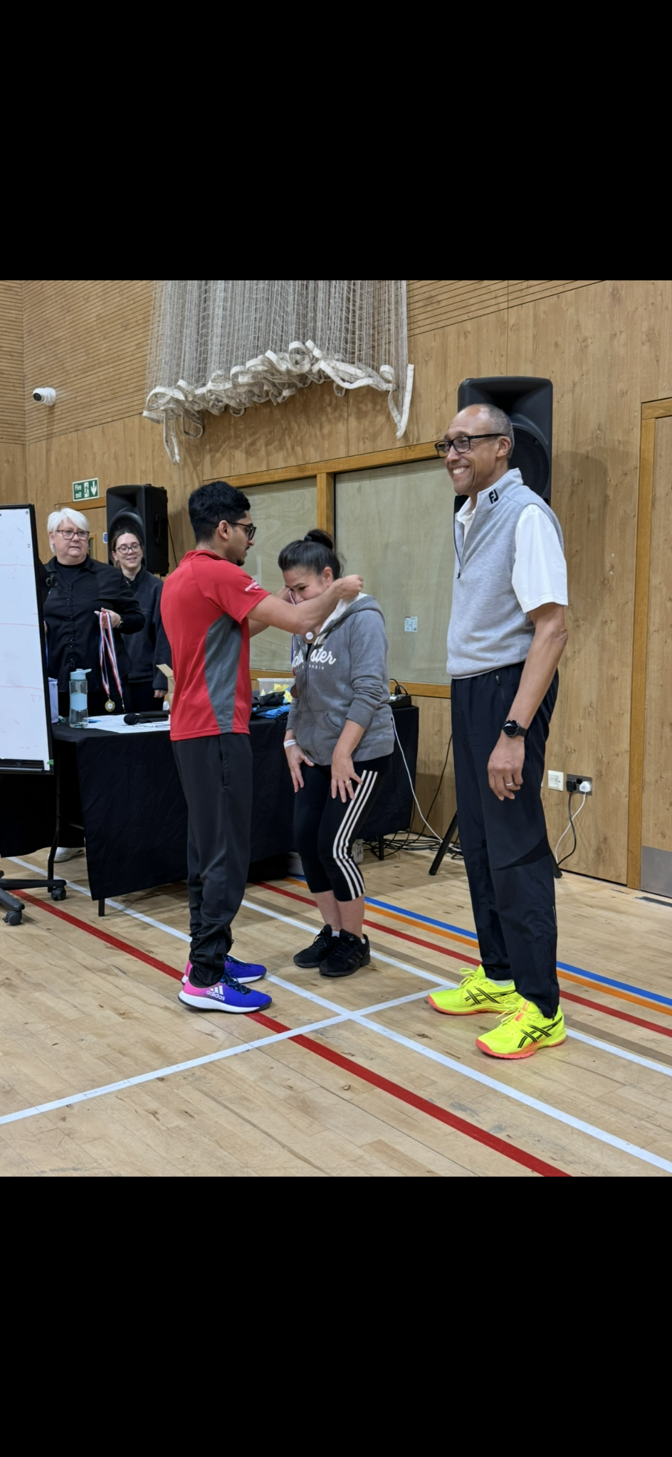 Kush presenting a medal at the Woodside tournival